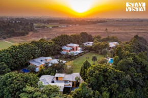 StayVista at The Manvi Estate - Pool, WiFi & Bonfire